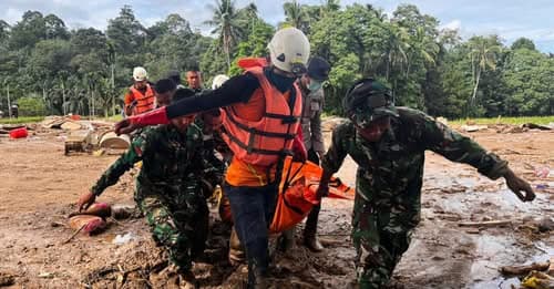 Indonesia Races to Find Hundreds Buried by Floods