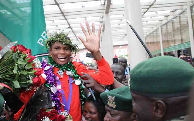 Pomp and colour as world champions jet back from Tokyo