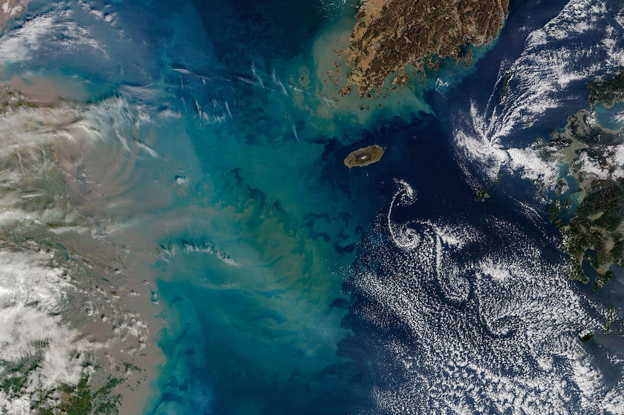 NASA Captures Mesmerizing Cloud Swirls Around South Korea's Jeju Island
