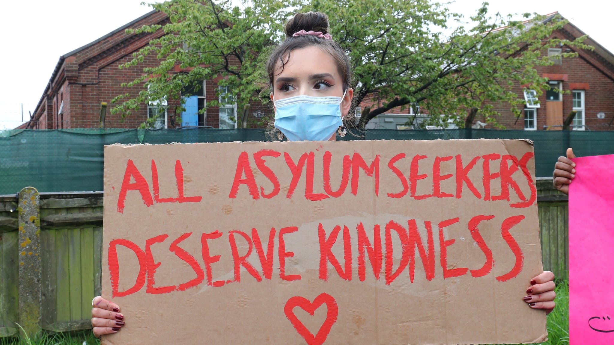 UK Defends Costlier Barracks for Asylum Seekers Amid Protests