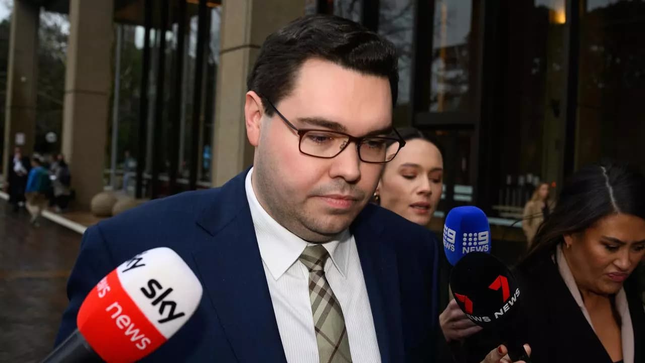 Former Staffer Seeks State Funding for Legal Battle Over 'James Bond-like' Allegations